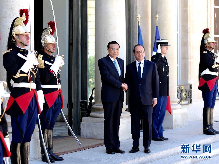當地時間6月30日下午，中國國務院總理李克強在巴黎愛麗舍宮會見法國總統奧朗德。 新華社記者馬占成攝 