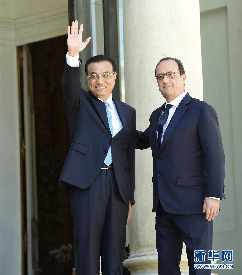 當地時間6月30日下午，中國國務院總理李克強在巴黎愛麗舍宮會見法國總統奧朗德。 新華社記者李學仁攝 