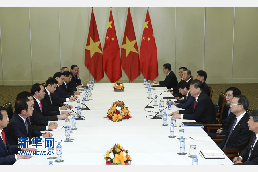 11月19日，國家主席習近平在利馬會見越南國家主席陳大光。新華社記者 龐興雷 攝 