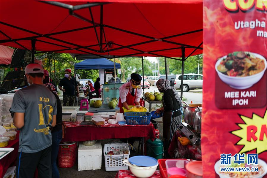 （國際&middot;圖文互動）（5）通訊：前方總有機遇&mdash;&mdash;記馬來西亞一位飛行員疫情下擺攤再就業